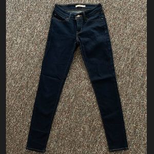 Levi’s 711 blue jeans.
